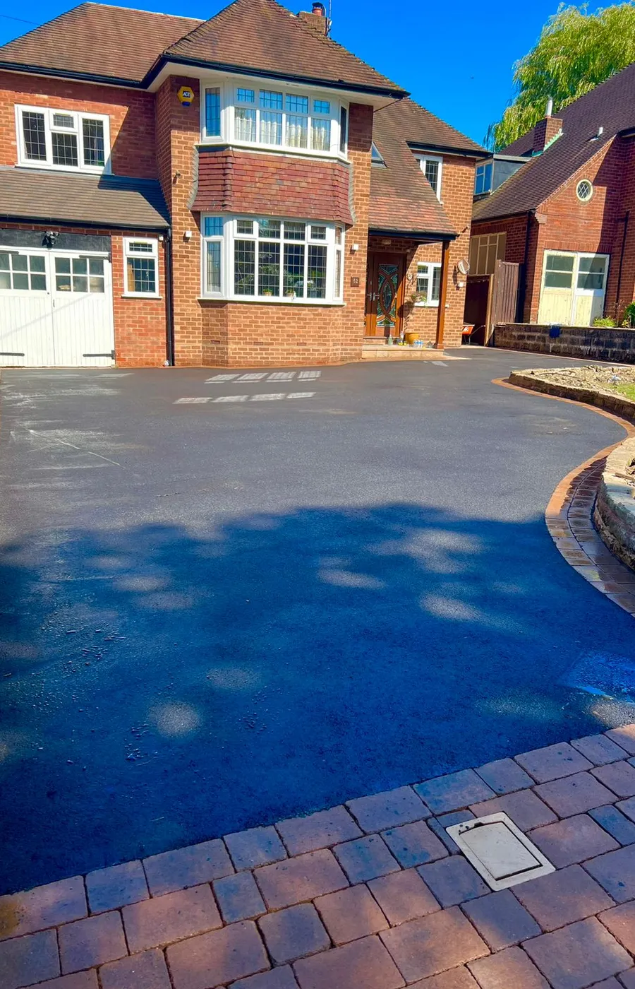 Marshall Driveways Ltd team completing a tarmac driveway installation in Wolverhampton